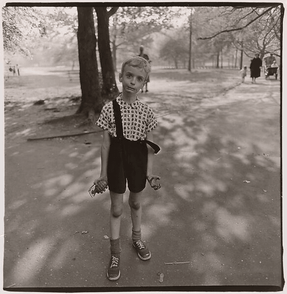 Child with a toy hand grenade in Central Park, N.Y.C. || https://www.metmuseum.org/art/collection/search/284712