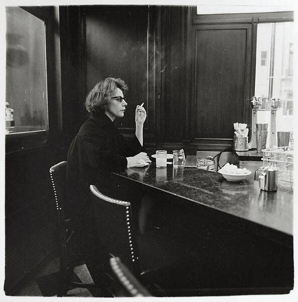 Woman at a counter smoking, N.Y.C. || https://www.metmuseum.org/art/collection/search/306315